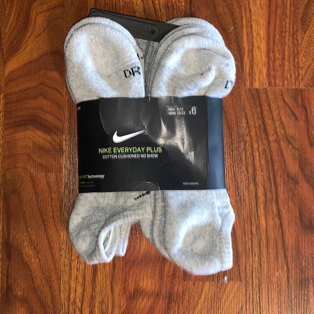 Men’s Nike gray Dri-fit socks. One pair missing.